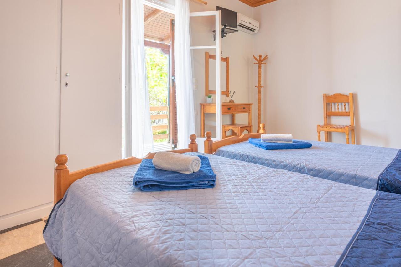 Villa Popi On The Beach Of Agios Gordios อากิออส กอร์ดิออส ภายนอก รูปภาพ